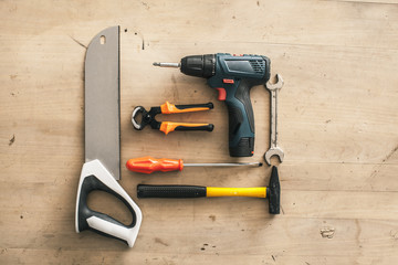 Building tool repair equipments wooden background