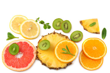 healthy background. slices of grapefruit, kiwi fruit, orange and pineapple isolated on white background top view