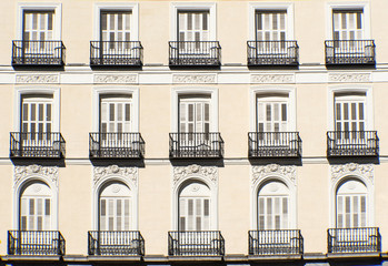 Facade with balconies seen in Madrid, Spain