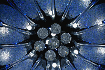 Close up view to soviet luster in black background. Detailed glass sparkles blue lustre 