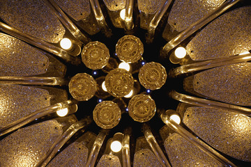 Close up view to soviet luster in black background. Detailed glass sparkles yellow blue lustre 