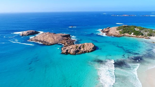 Aerial view of picturesque coastline of Twilight Cove, beach, rocks and crystal clear waters of Southern Ocean - Esperance, Western Australia from above, 4k UHD