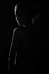 black and white profile portrait of female in back ligt art photography