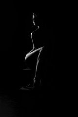 black and white female body in back light art photography - 195057261