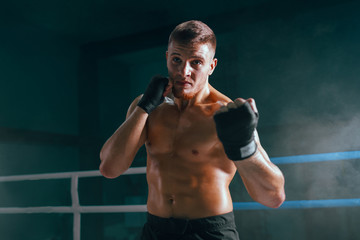 Fototapeta na wymiar professional boxer on boxing ring, boxing training