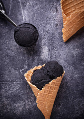 Black ice cream. Trendy food