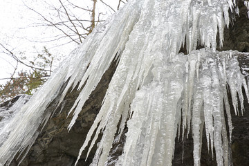 Winter at frozen lake national park with icicles on the trail