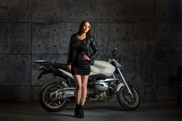 Obraz na płótnie Canvas girl and motorcycle