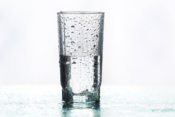 Half full half empty glass of water