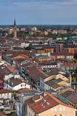 Fototapeta na wymiar View of the city of Pordenone from above and in the background the bell tower of San Marco. Italy