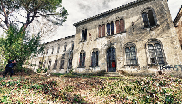 VOLTERRA, ITALY - FEBRUARY 24, 2018: Exterior view of Charcot building. It is part of the of abandoned asylum, closed in 1984