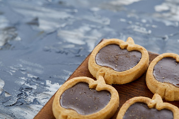 Top view close-up picture of tasty cookies on the cutting board, shallow depth of field, selective focus