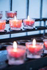 Opferkerze in Kirche, Spende