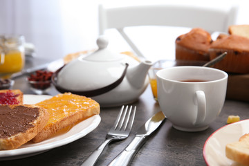 Delicious breakfast served on table