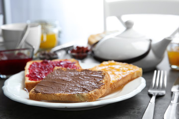 Delicious breakfast served on table