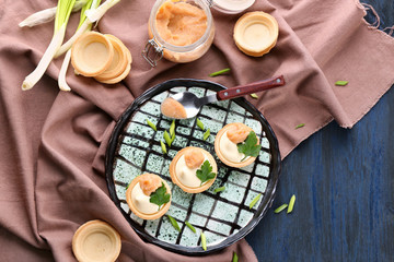 Tasty appetizer with codfish caviar on plate