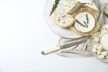 Different cheeses on white background. Fresh dairy products