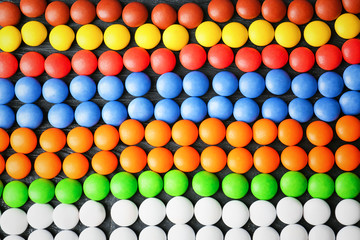 Many colorful candies, top view
