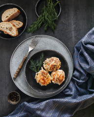 Home cooking. For the holiday - baked meatballs on a plate.