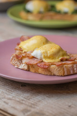 Toast with egg and bacon, sprinkled with sauce