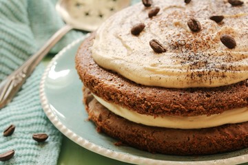 Homemade Coffee Expresso cake with  white chocolate mocha frosting, close up selective focus