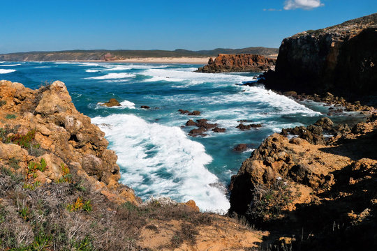 rough coast at Carrapateira with Praia da Bordeira in the background
