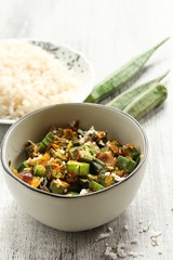 Okra or bhindi fry with fresh cocnut, selective focus