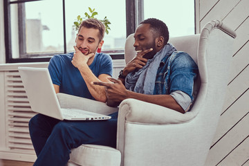 Two young students. An African-American and Caucasian friends wo