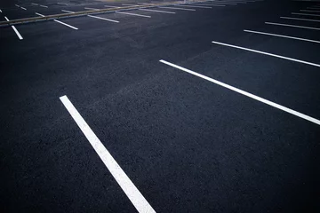 Fototapeten Acres of empty parking spaces © freebreath