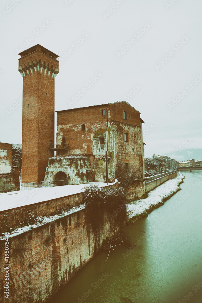 Canvas Prints citadel of pisa with famous lungarni after a snowfall. medieval building of tuscany, italy