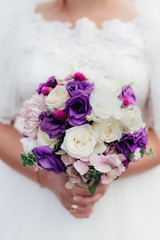 wedding bouquet in purple tones