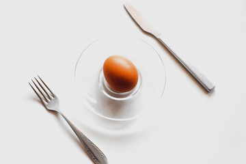 Fresh, raw eggs on a white background. Minimalism and ecology. Healthy lifestyle.