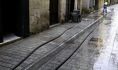 Sweeper with hose