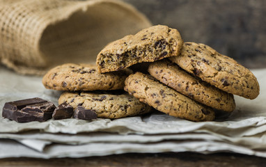 Freshly Baked Chocolate Cookies on Baking Paper. Sweet Biscuits. Homemade pastry.