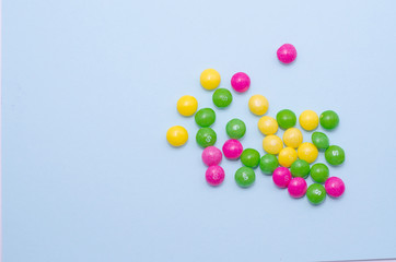 Colorful candies on background, Free space for text.