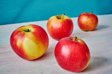 apples on wooden table