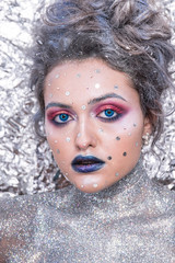 Winter portrait attractive girl in bright makeup