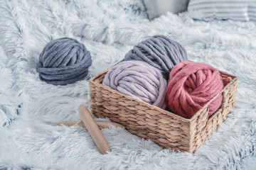 Fototapeta na wymiar Balls of super chunky merino woolen yarn