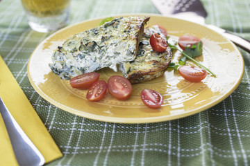 Crustless Chard Quiche Served With Tomatoes