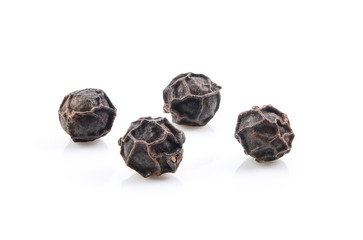 pepper seeds on white background
