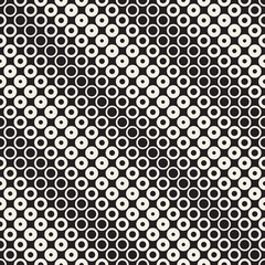Fototapeta na wymiar Halftone circles vector seamless pattern. Abstract geometric texture with size gradation of rings. Gradient transition effect background,