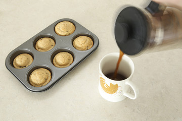 Obraz na płótnie Canvas homemade muffin and a mug of coffee