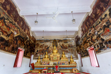 historical place, Wat Ubosatharam. The temple houses many artifacts such as wall murals...