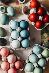 Packages with Dyed eggs for Easter holidays, colored  with red,blue,green and pink tint inside...