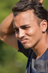 Fototapeta premium Young Colombian Male And Confusion
