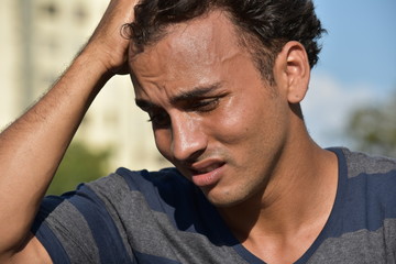 Obraz premium Worried Latino Male