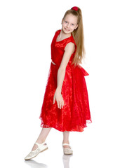 Elegant girl in a dress.