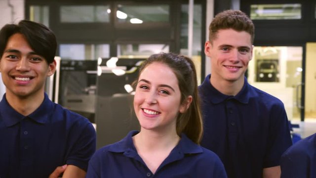 Portrait Of Engineering Apprentices In Factory