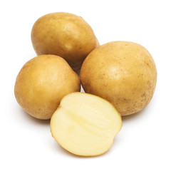 Young potatoes whole and slice isolated on white background. Harvest new. Flat lay, top view