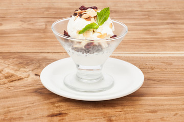 dessert cup with ice cream and red berries